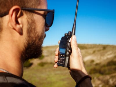 Young man on walkie talkie